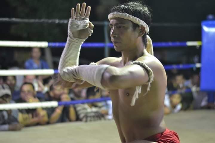 Trainer Kru Padu performing the Wai Kru Ram Muay